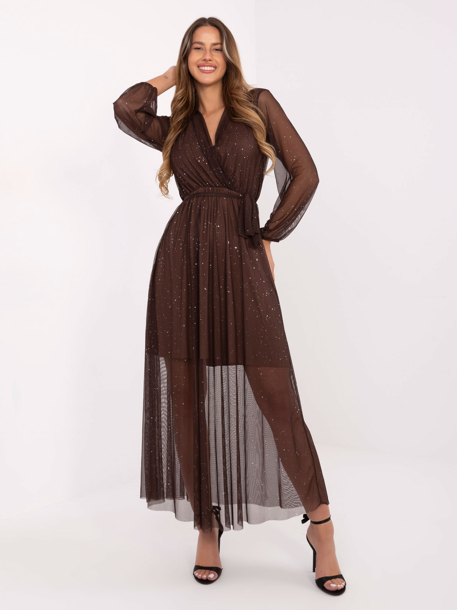 Brown maxi evening dress with appliqués.