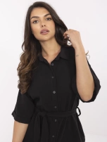 Black muslin jumpsuit with short sleeves.
