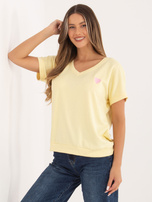 Miętowa damska bluzka oversize z krótkim rękawem