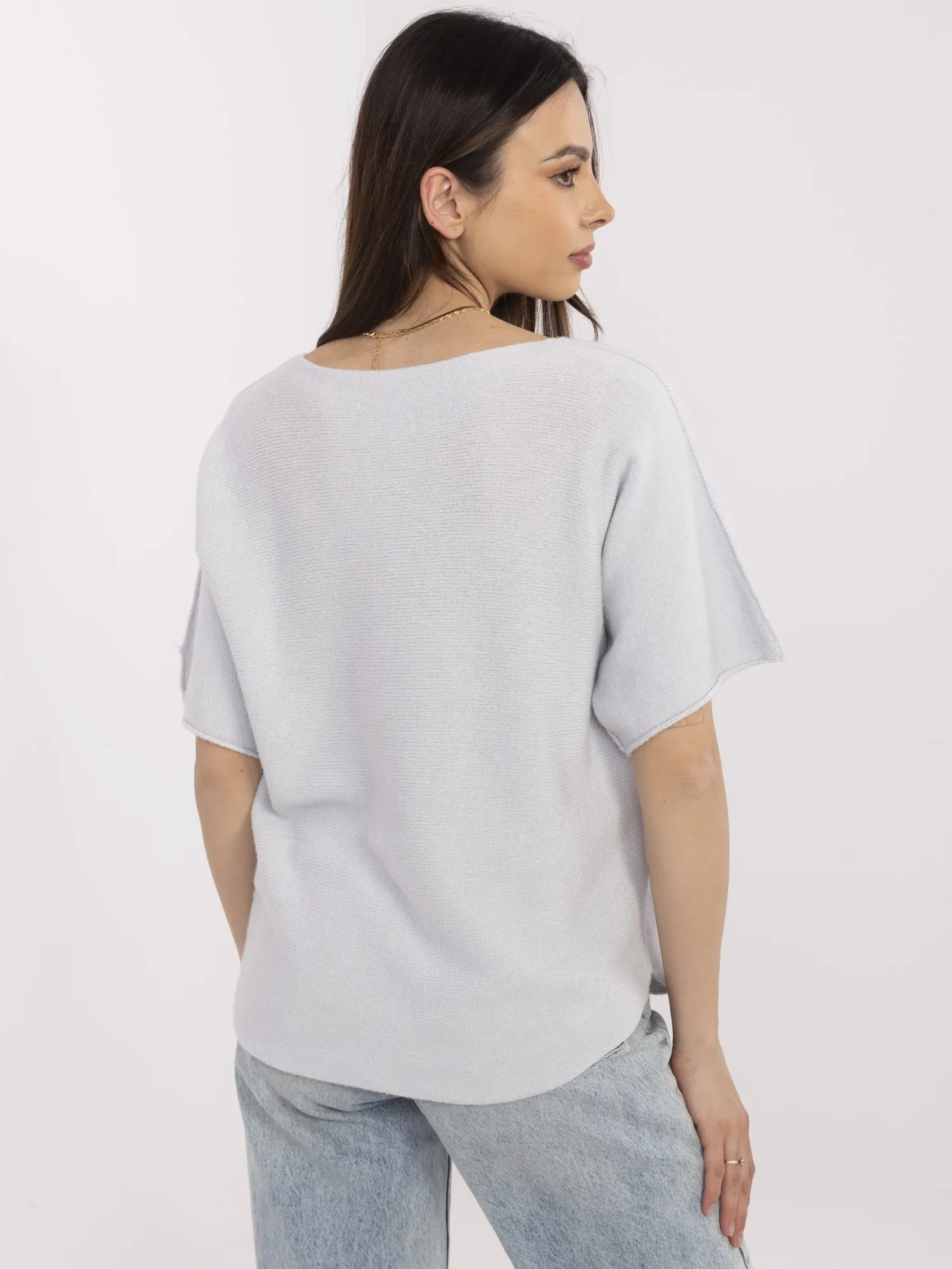 Light gray women's basic sweater with short sleeves.