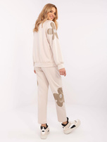 Hurt Beżowy damski komplet ze wstawkami w kwiaty