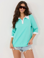 Miętowa luźna bluzka z guzikami przy dekolcie