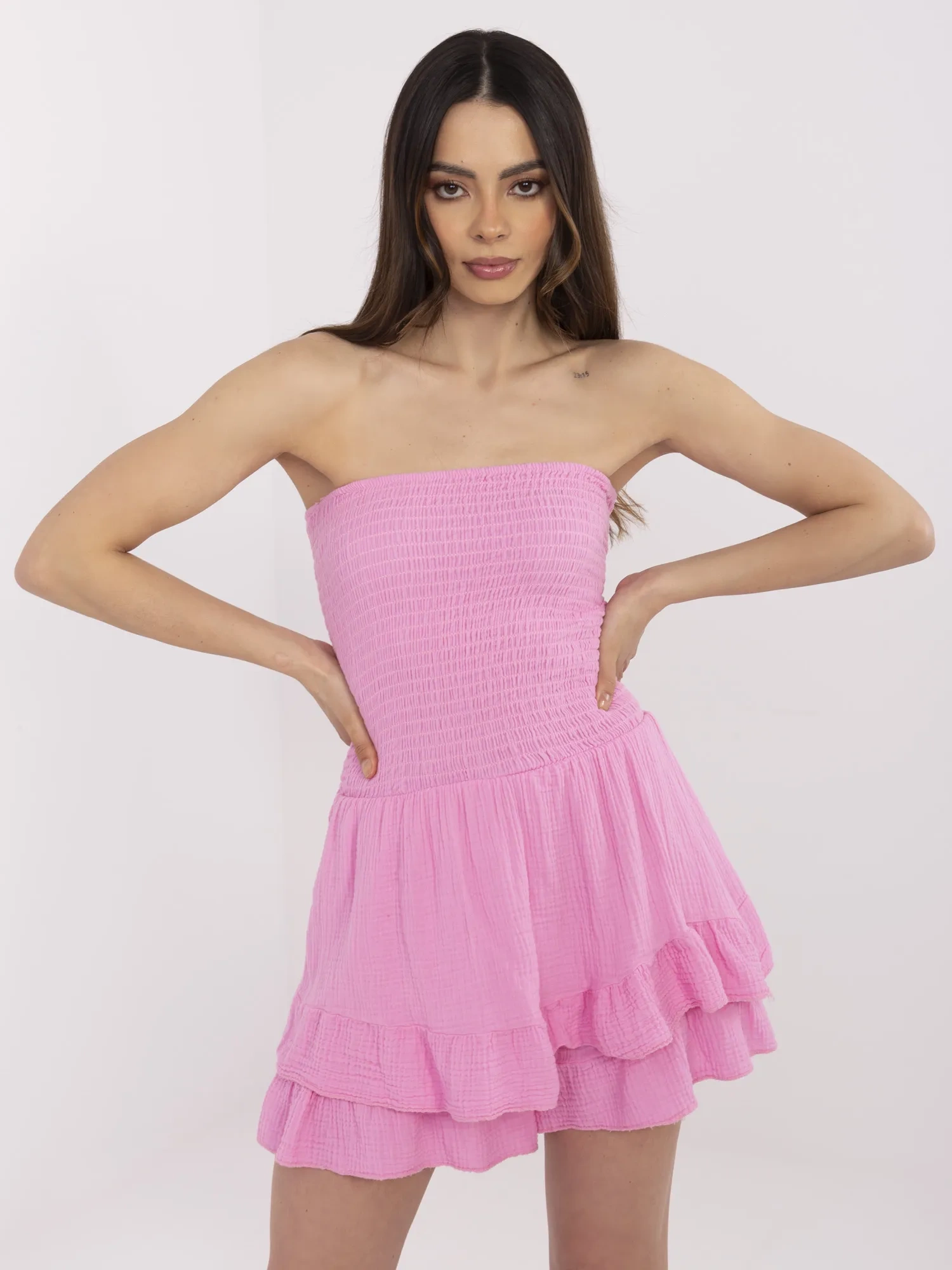 Pink muslin sleeveless jumpsuit.
