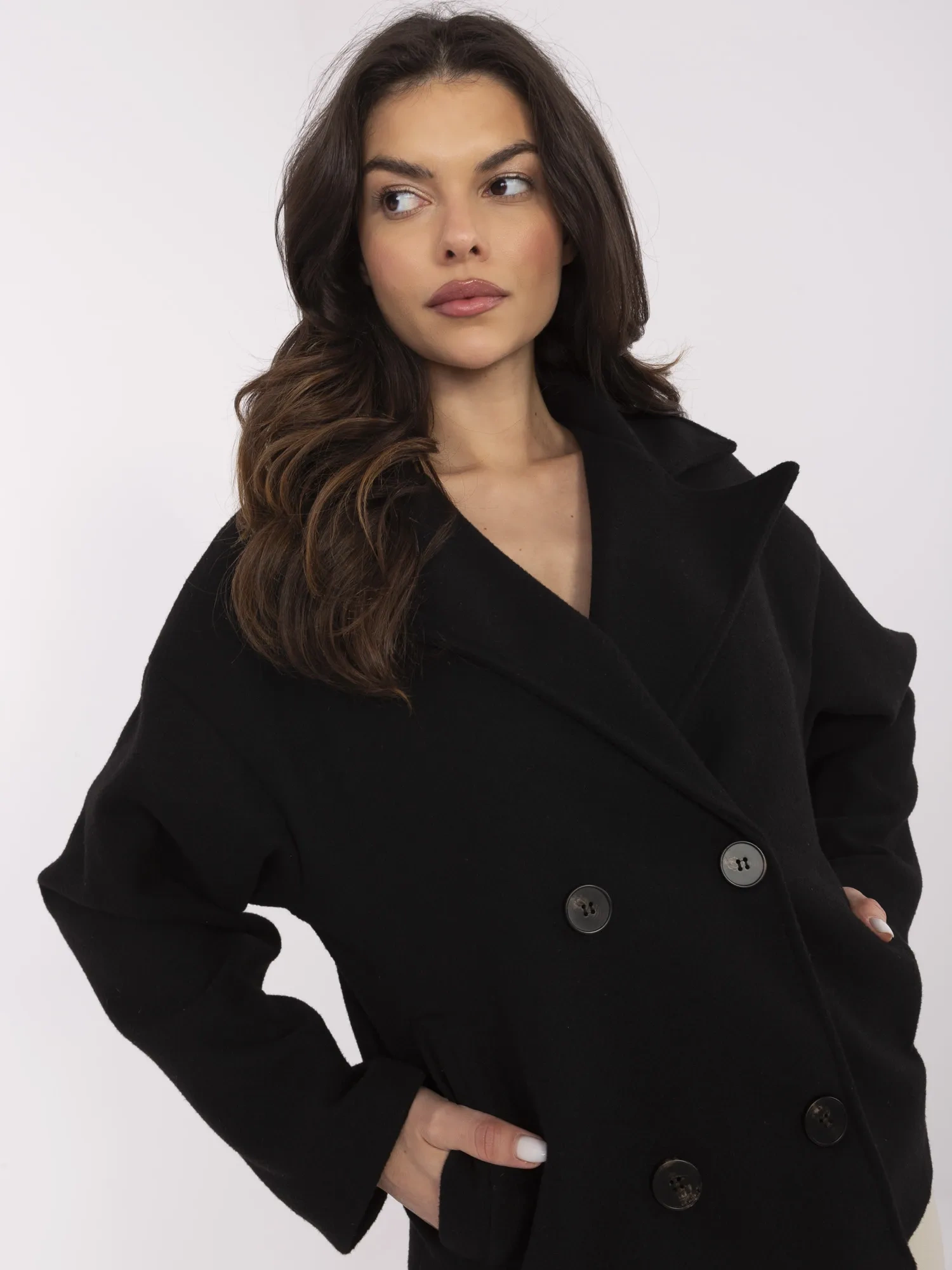 Black short coat with double-breasted fastening.