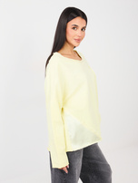 Jasnożółta bluzka overssize z wstawkami z satyny 