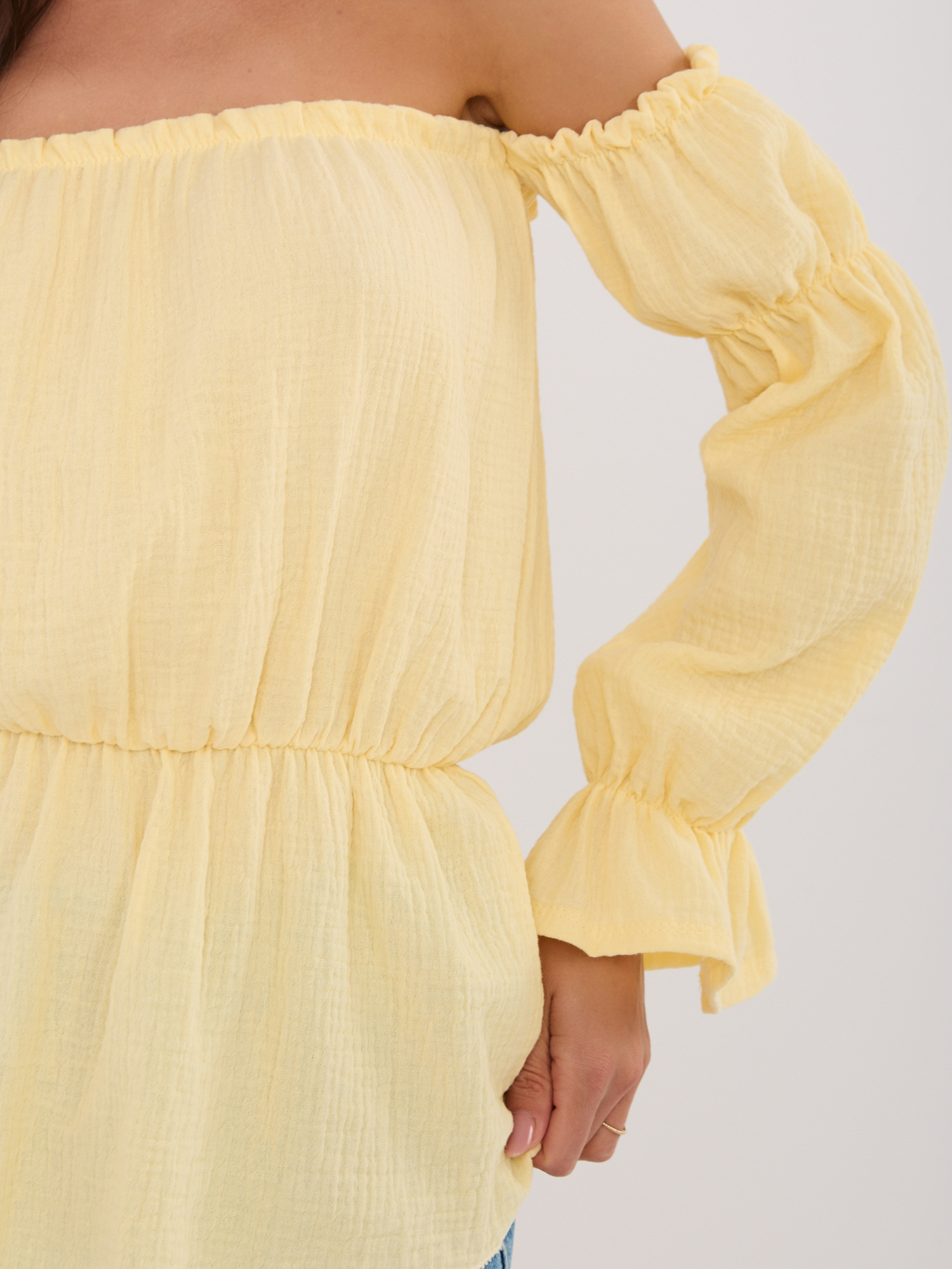 Jasnożółta muślinowa bluzka z gumką w talii