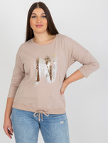 Hurtownia Beżowo-brązowa bluzka plus size z aplikacją