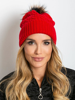 Red cap with ribbing and fur pompom 