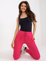 Hurt Fuksjowe spodnie dresowe z ozdobnymi guzikami