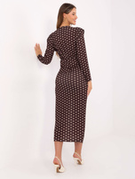 Dark brown draped dress with polka dots.