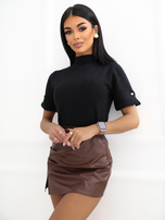Black sweater with decorative slits on the sleeves.