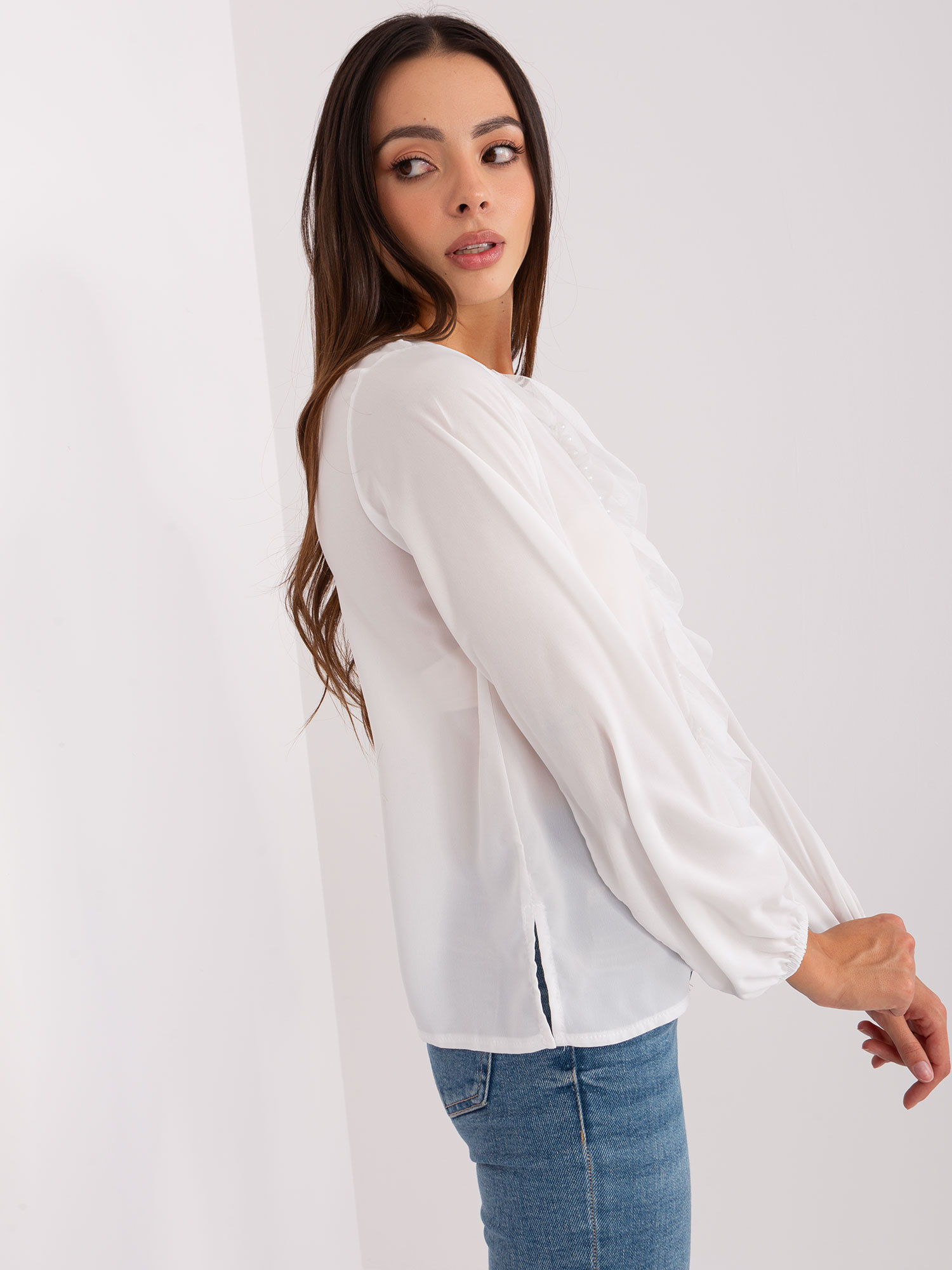 Hurt Ecru women's blouse with an application.