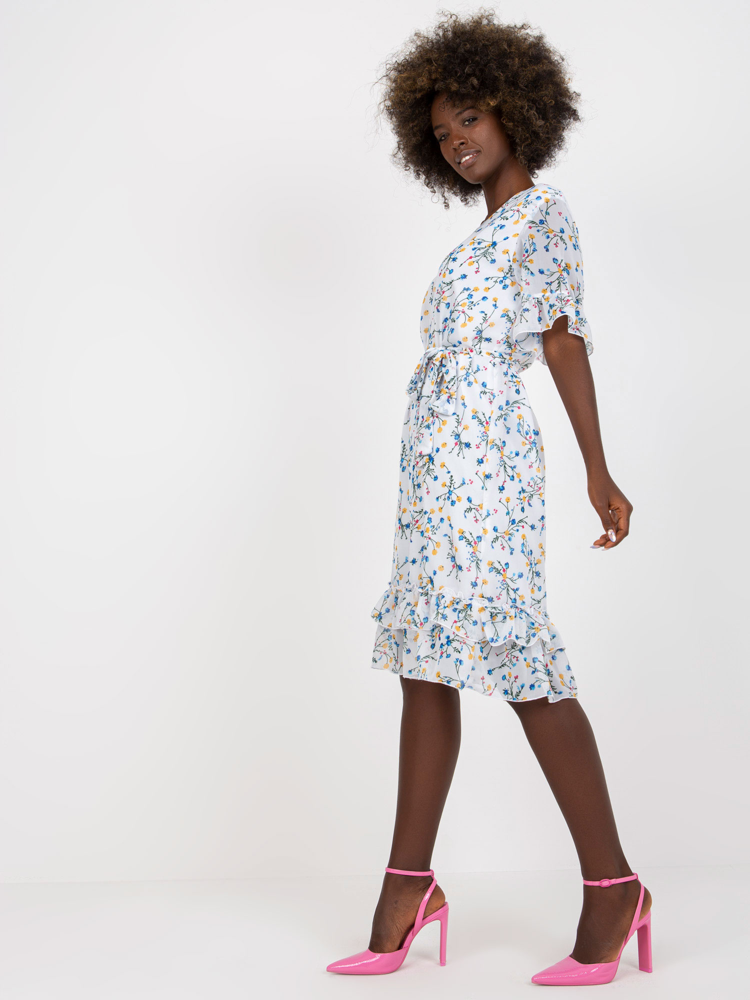 White midi dress with floral pattern and flounces