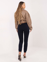 Granatowe spodnie Faster