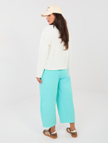 Turkusowe jeansowe spodnie z kieszeniami RUE PARIS 