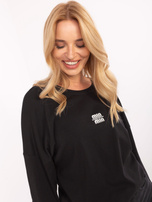 Czarna casualowa bluzka z aplikacją