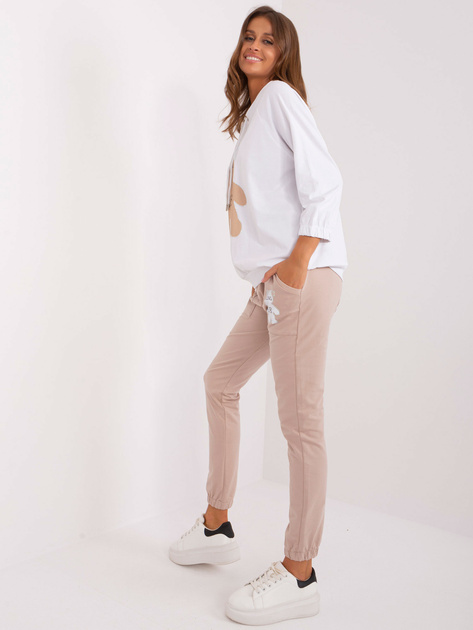 Hurt Ecru-beżowy damski komplet dresowy z aplikacją