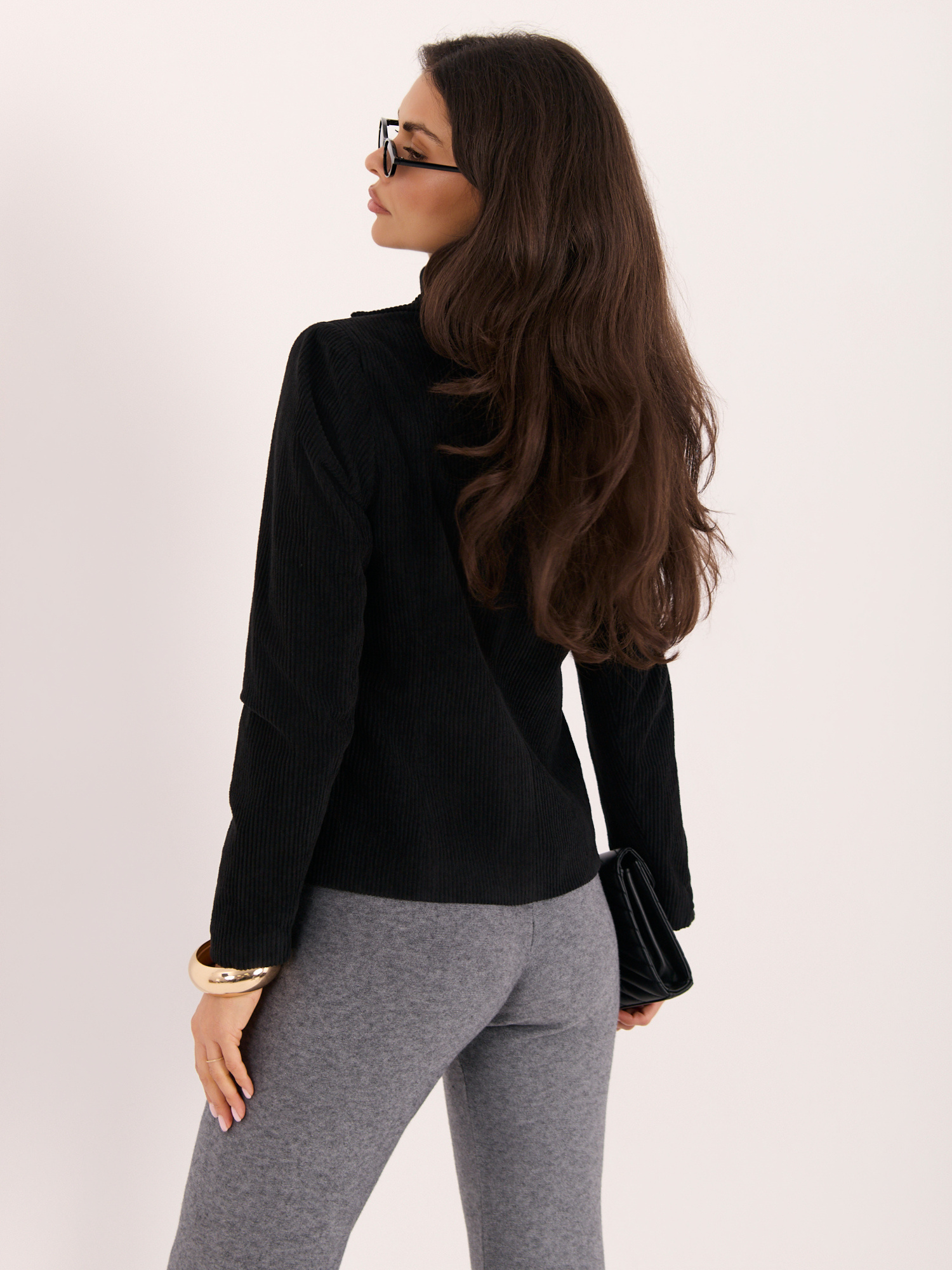 Black fitted corduroy blazer.