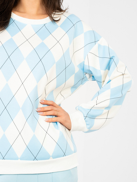 Pastelowa niebieska bluza w geometryczne wzory