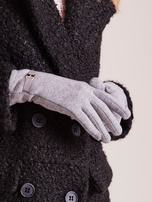 Graue elegante Handschuhe.