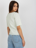 Hurt Light green blouse for special occasions with a round neckline.