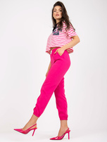 Fuksjowe spodnie materiałowe ze ściągaczami