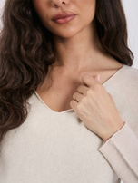 Beige women's basic sweater with a V-neck.