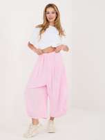 Jasnoróżowe  damskie spodnie alladynki z sztruksu