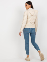 Hurt Jasnobeżowa przejściowa kurtka pikowana z kapturem i torebką 