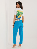 Niebieskie sztruksowe spodnie z nogawką 7/8