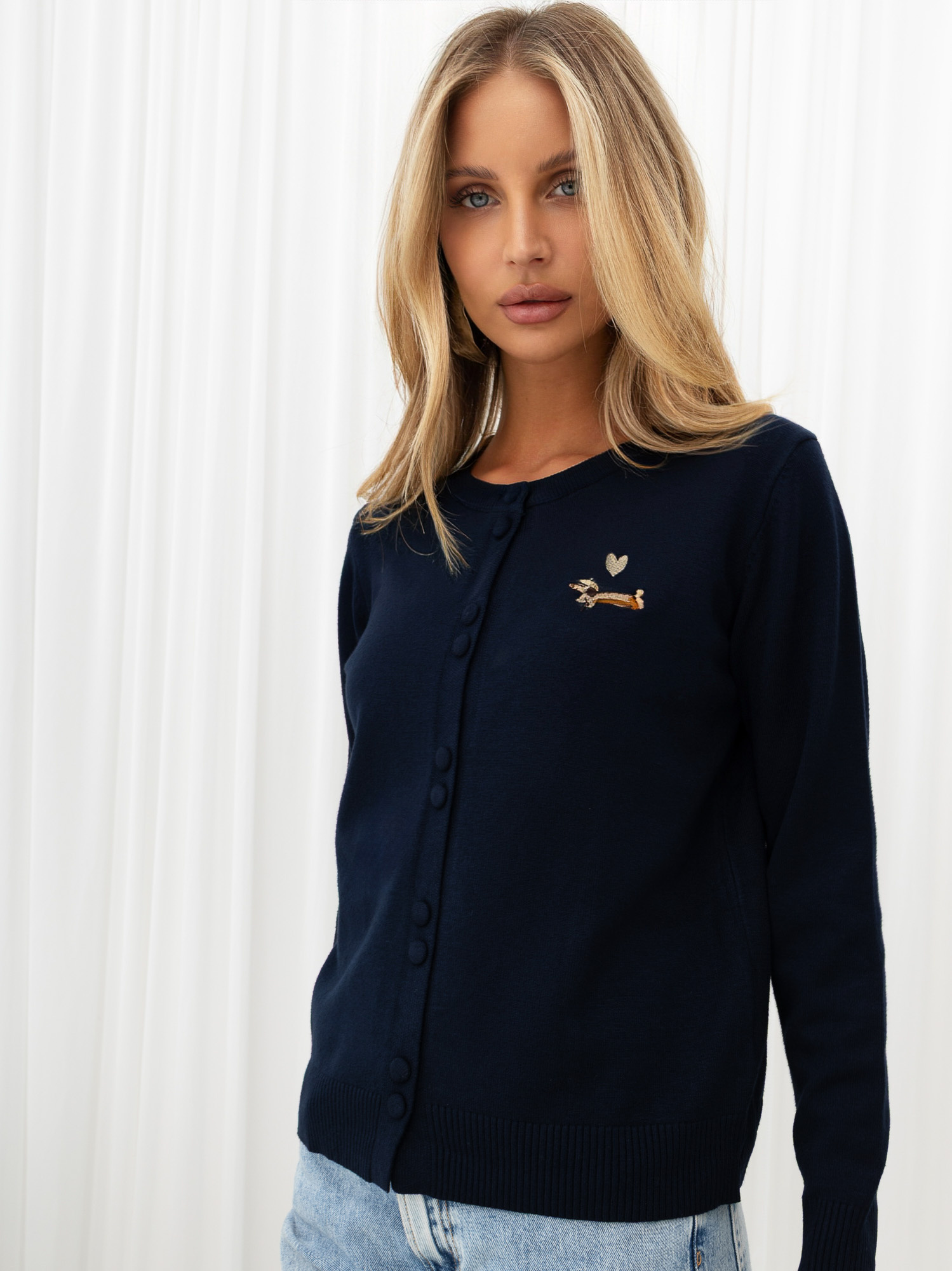 Navy blue short cardigan with an embroidered puppy.