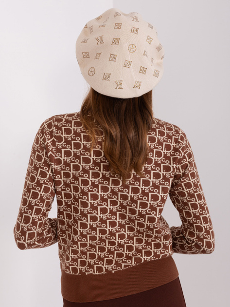 Hurtownia Jasnobeżowy damski beret z aplikacją