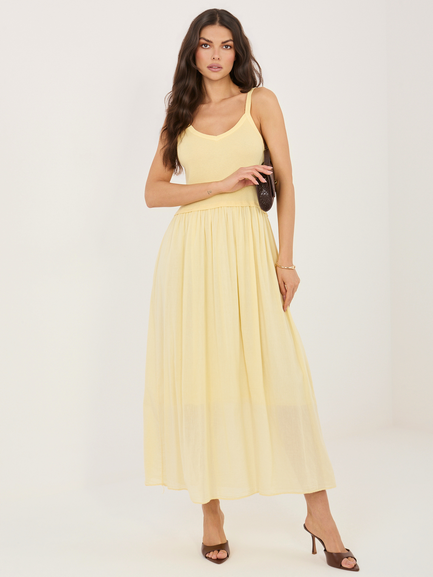 Light yellow flared cotton dress.