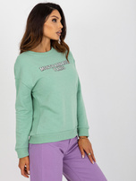 Hurt Jasnozielona dresowa bluza bez kaptura z nadrukiem