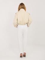 Ecru materiałowe spodnie z prostą nogawką