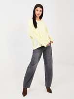 Jasnożółta bluzka overssize z wstawkami z satyny 