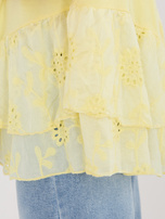 Jasnożółta rozkloszowana bluzka z haftem 