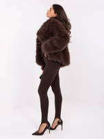 Beige women's boucle sweater with 3/4 sleeves.