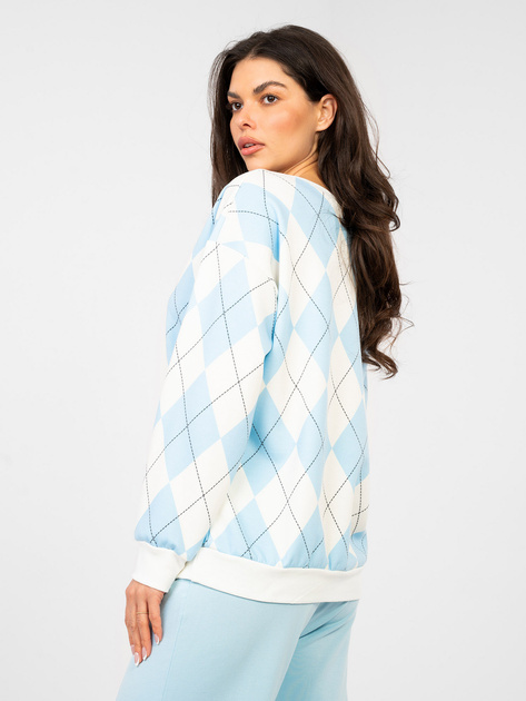 Pastelowa niebieska bluza w geometryczne wzory