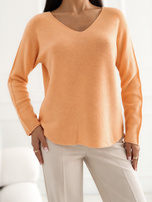 Light orange basic sweater with a V-neck.