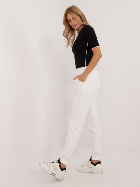 Ecru ocieplane spodnie dresowe ze ściągaczem