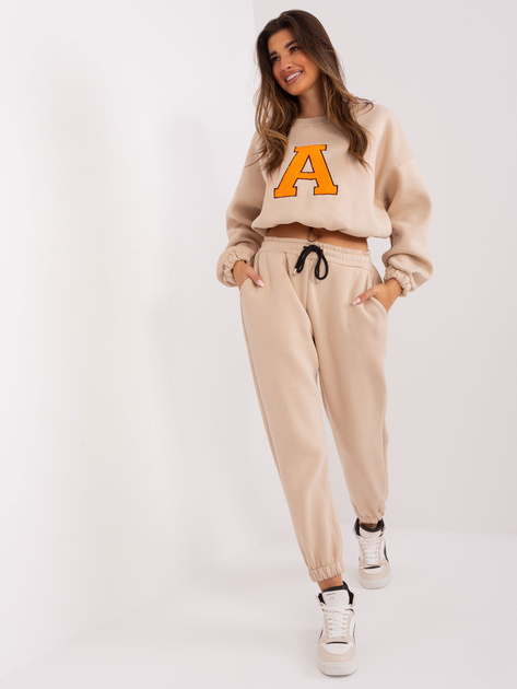 Hurt Beżowo-fluo pomarańczowy komplet dresowy z naszywką