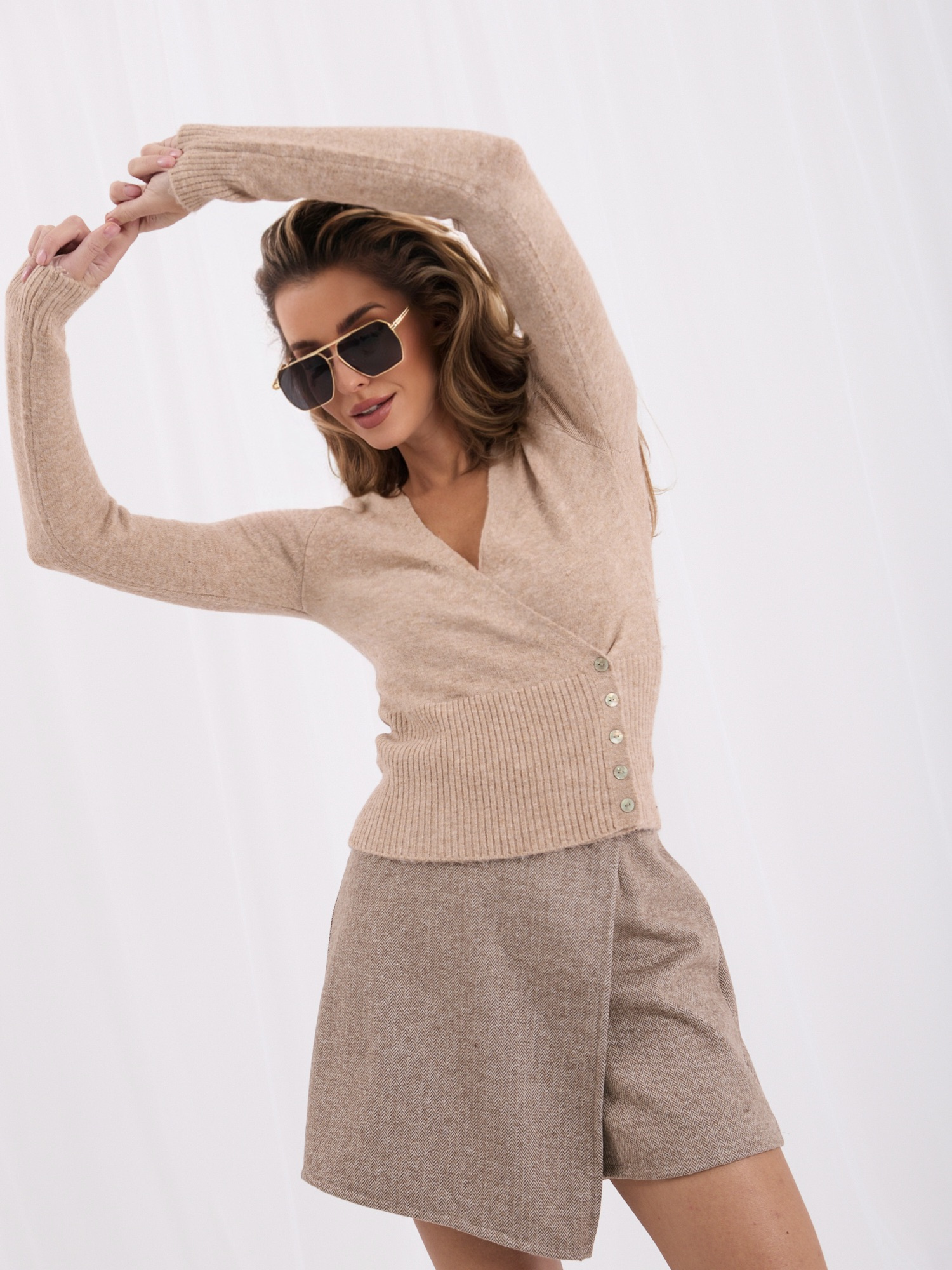 Dark beige wrap sweater with a wool blend.