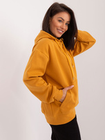 Hurt Musztardowa gładka bluza kangurka ze ściągaczami