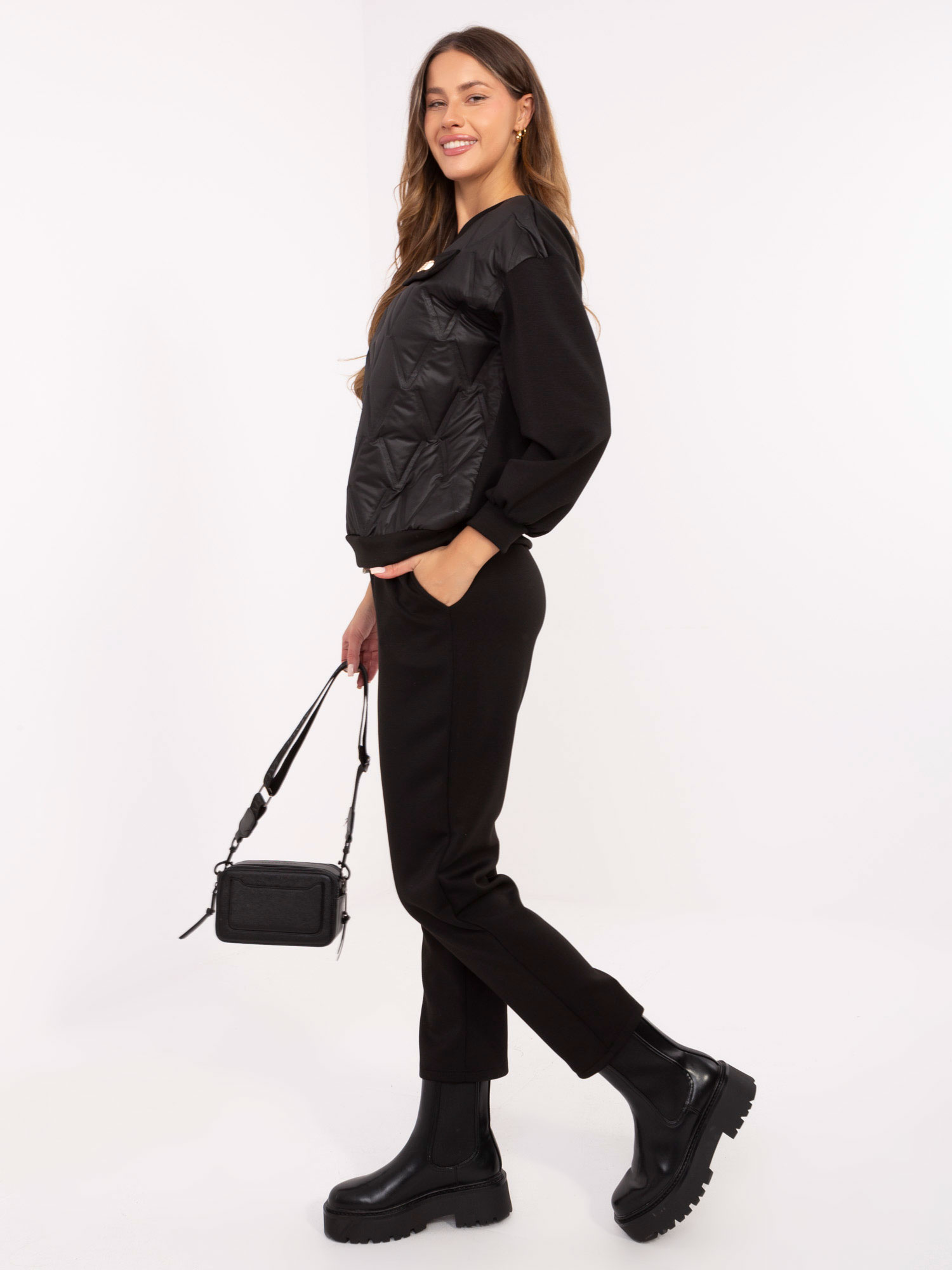 Black casual set with a detachable brooch.