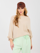 Pastelowy sweter oversize o kroju nietoperza