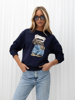 Navy sweatshirt with a round neckline and a bear applique.