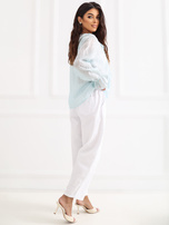 Miętowa prześwitująca bluzka w paski