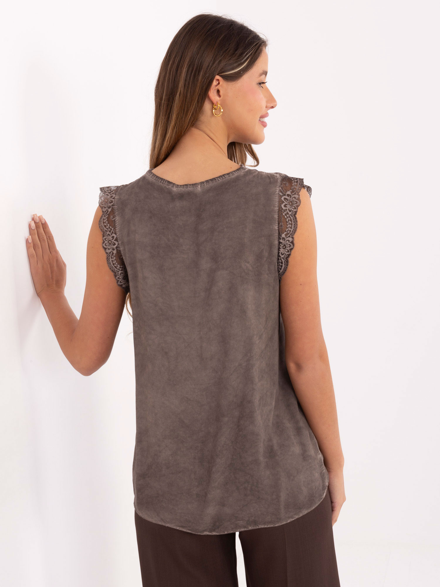 Dark beige women's top with a faded effect.