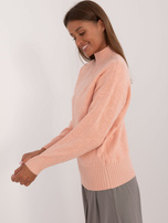 Hurt Brzoskwiniowy wzorzysty sweter z półgolfem 